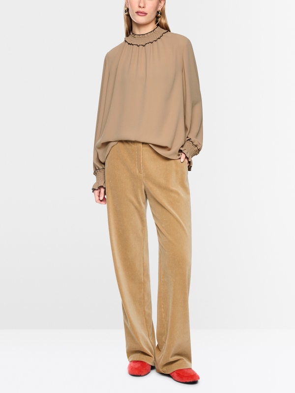 Loose-fitting blouse with smocking