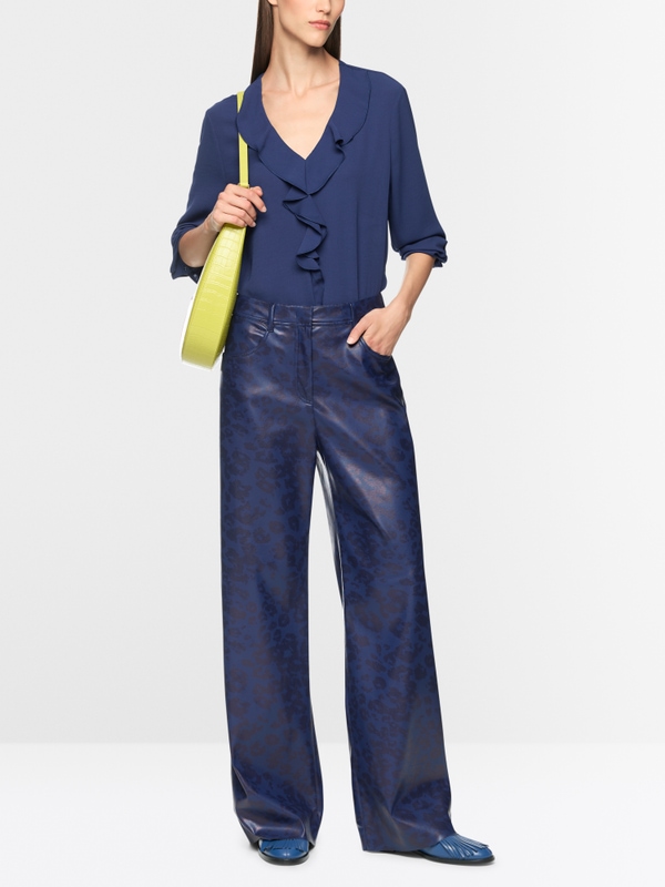 Blouse with flounces