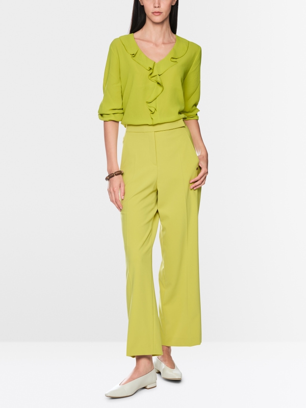 Blouse with flounces