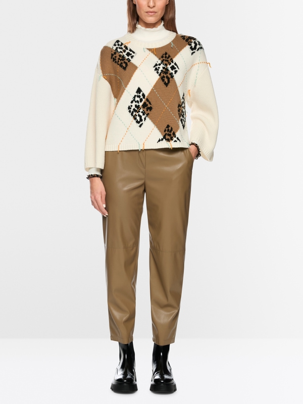 Wool jumper with argyle and fringes