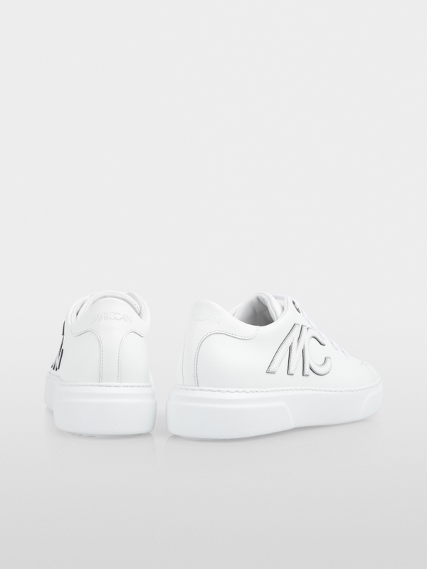 Baskets à semelles compensées en cuir de veau