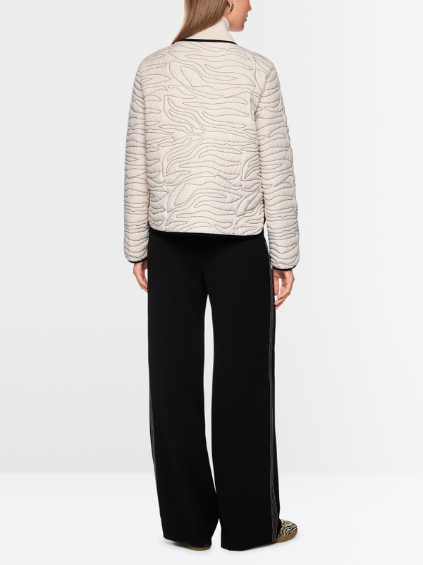 Veste matelassée courte avec détails tricotés