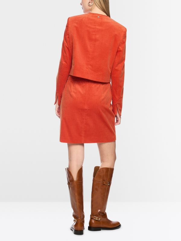 Short jacket with decorative buttons