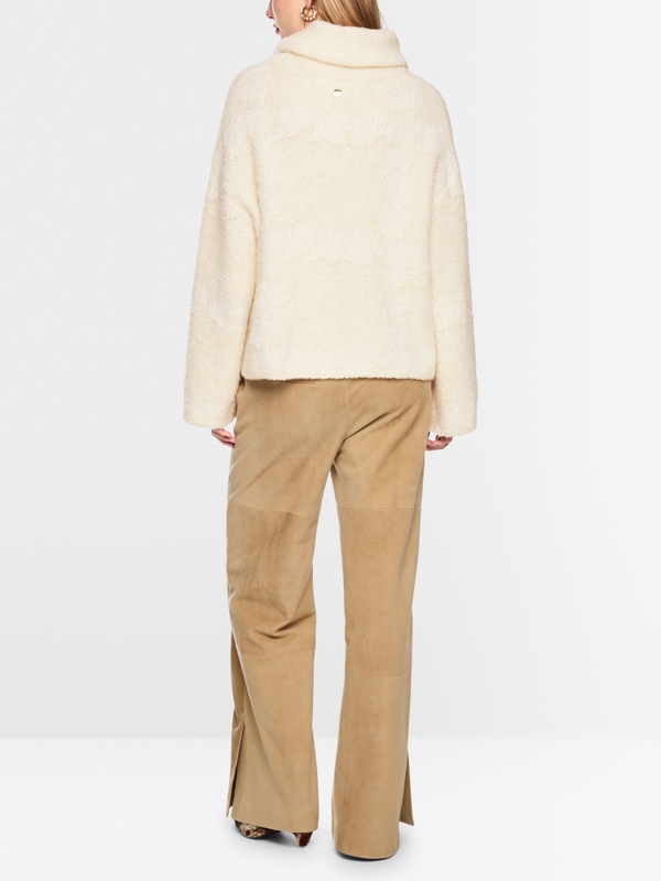 ‘Knitted in Germany’ turtleneck jumper