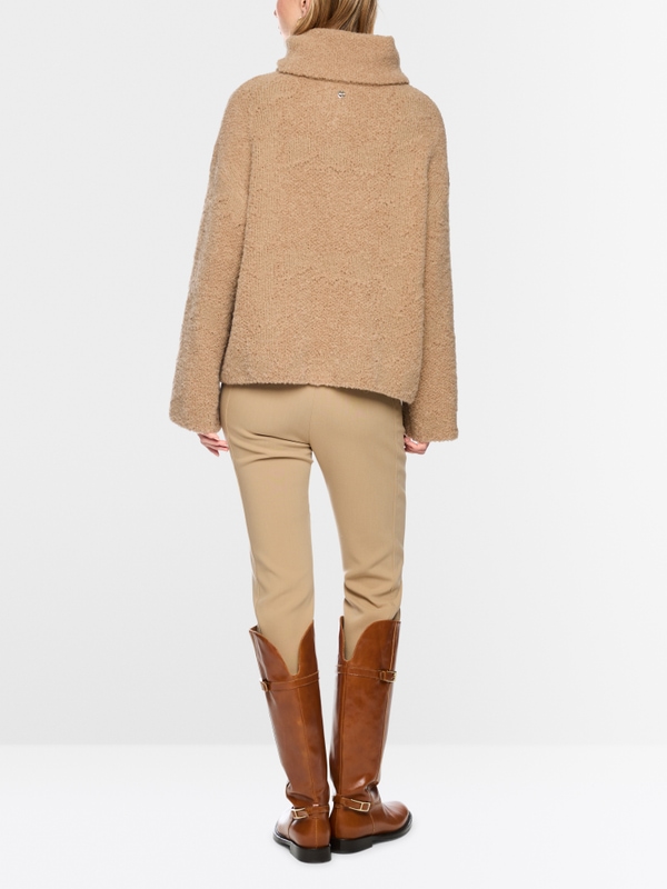 ‘Knitted in Germany’ turtleneck jumper