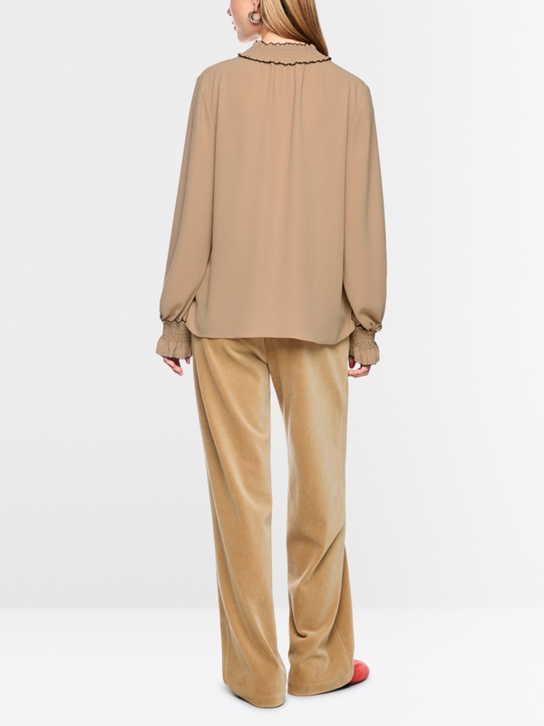Loose-fitting blouse with smocking