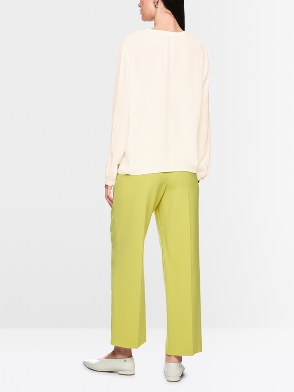 Blouse with flounces