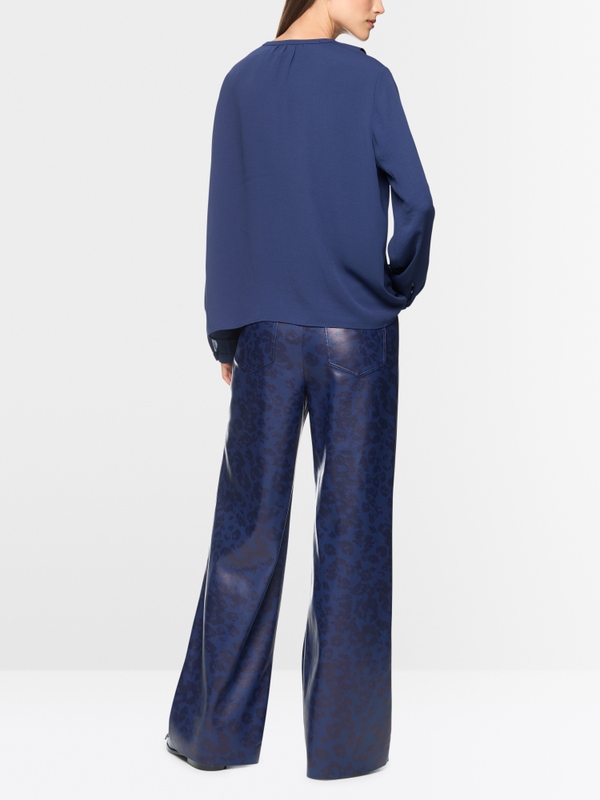 Blouse with flounces