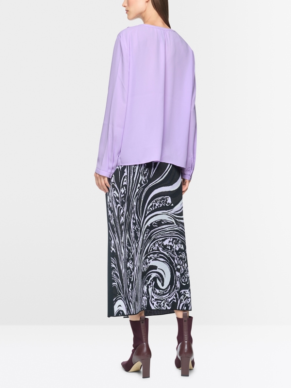 Blouse with flounces