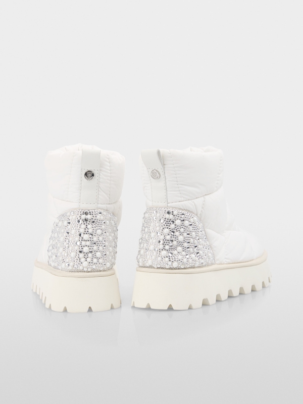 Slip-on boots with glitter details