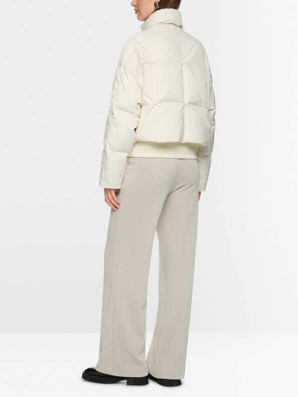 Quilted down jacket with knitted cuffs