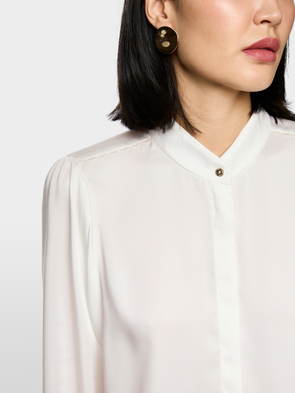 Blouse with lace and stand-up collar