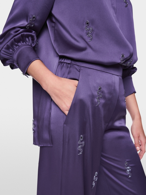 WELKOM snake embellishment trousers