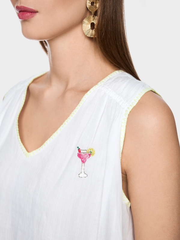 Loose top with embroidered patches