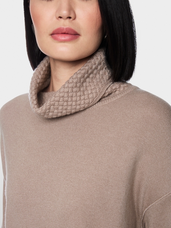 ‘Knitted in Germany’ turtle neck jumper