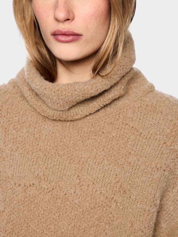 ‘Knitted in Germany’ turtleneck jumper