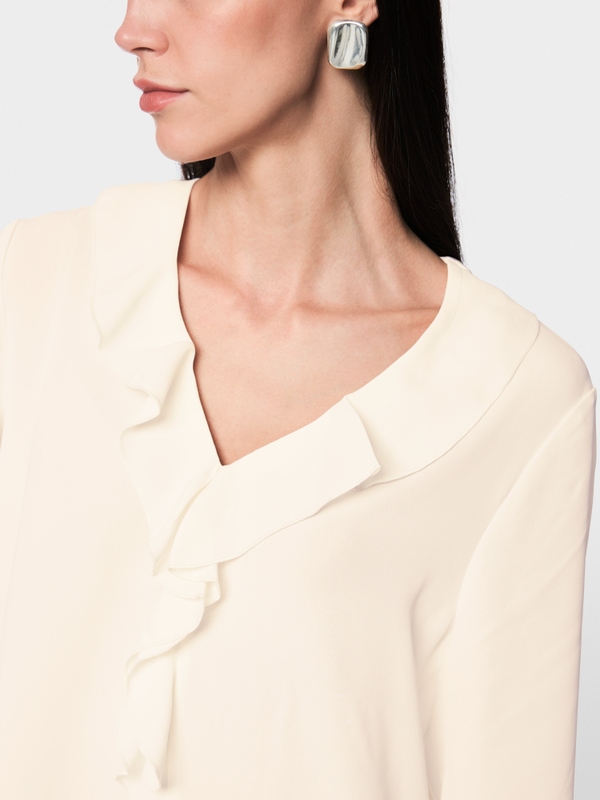 Blouse with flounces