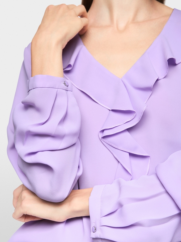 Blouse with flounces