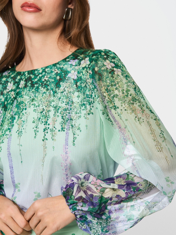 Tunic blouse with elasticated cuffs