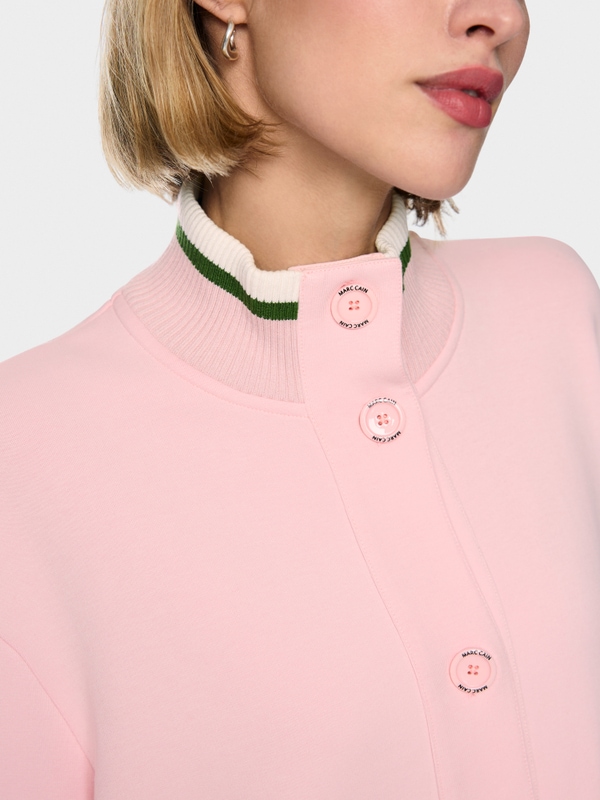 Jacket with knitted details