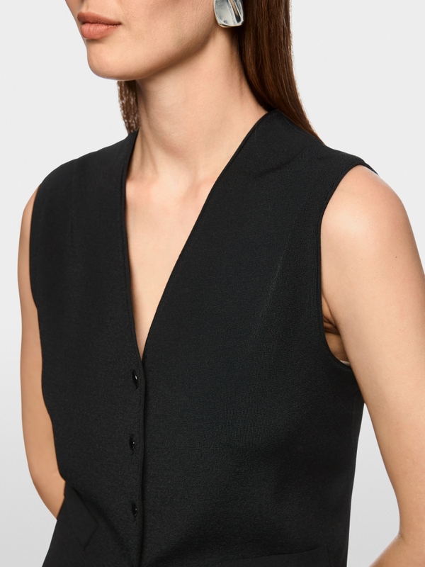 Getailleerd gebreid vest “Rethink Together”