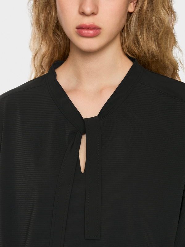 Shirt met strik ”Rethink Together”