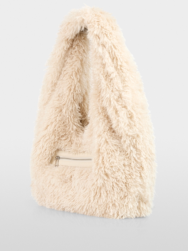 Shoulder bag in dog fur look