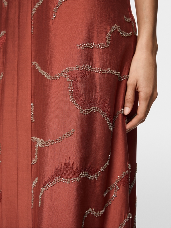 Mid-length dress featuring pearls