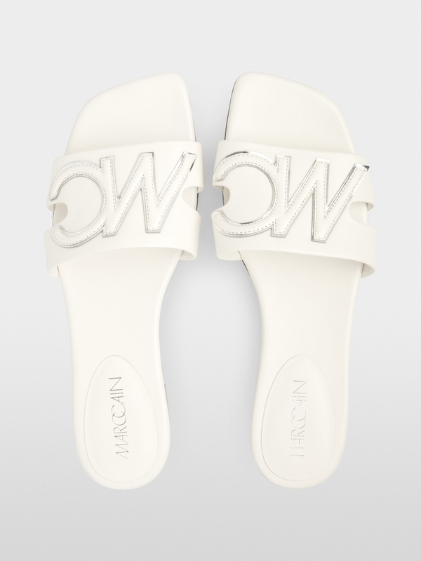 Sandales plates avec lanières décoratives