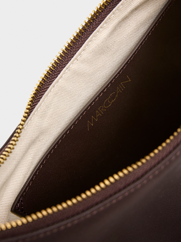 Hobo bag with studs and fringing