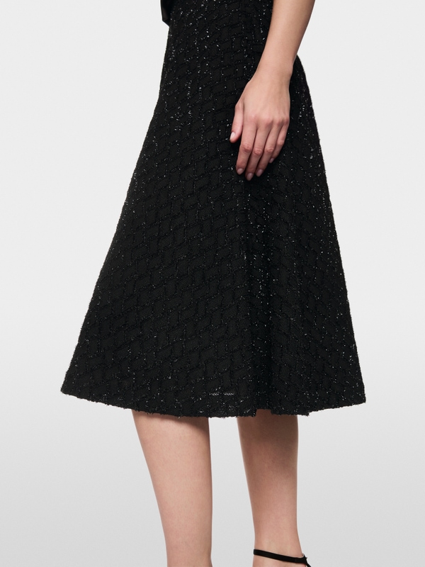 Swinging skirt with glitter details