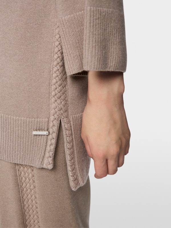 ‘Knitted in Germany’ turtle neck jumper