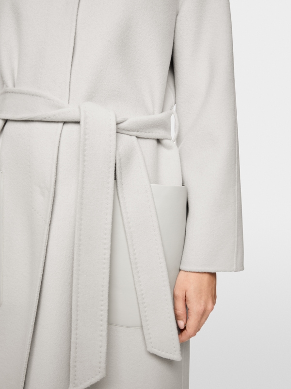 Short coat with leather details