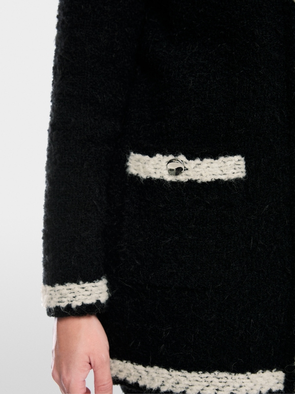 Cardigan bouclé tricoté en Allemagne