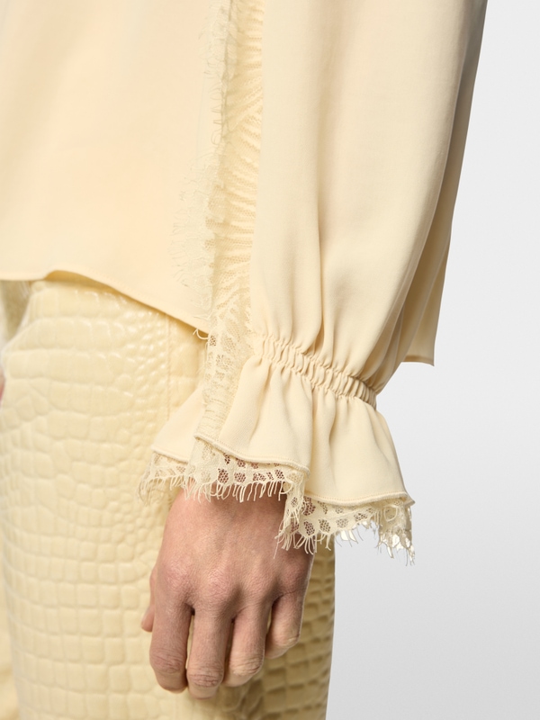 Flowing blouse with lace
