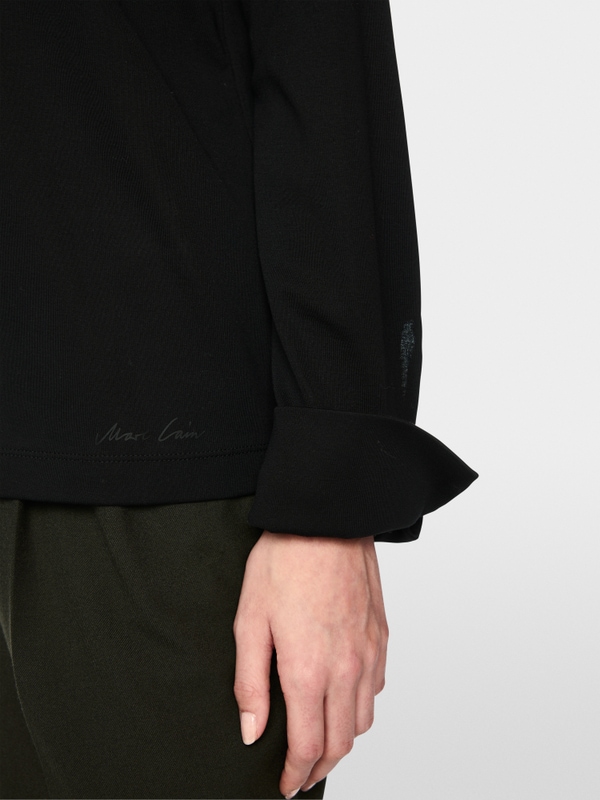 Blouse with glitter buttoning