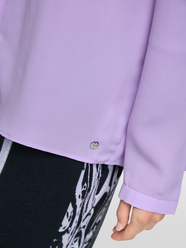 Blouse with flounces