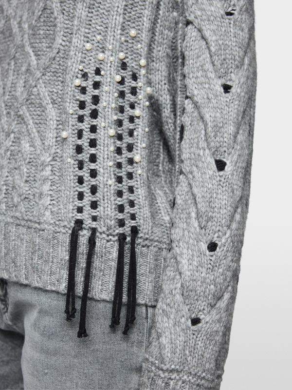 Cable-knit jumper with details