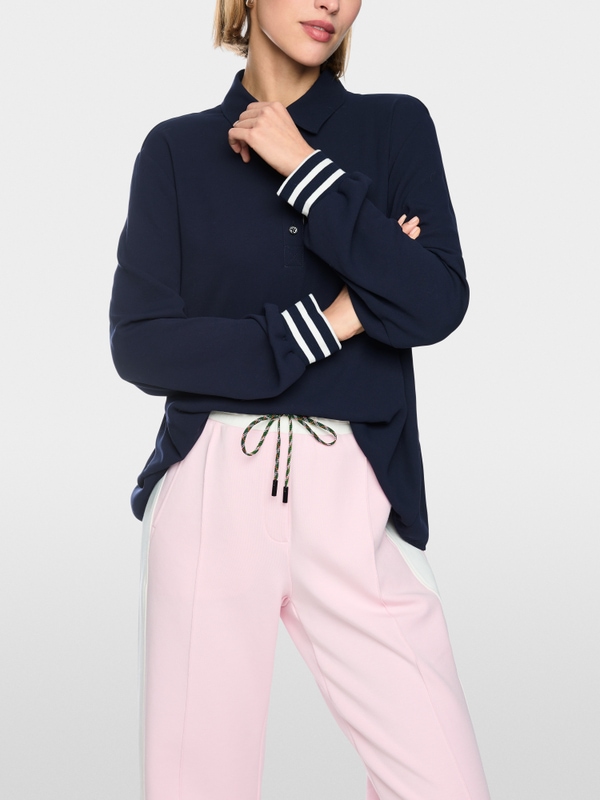 Blouse with polo collar and flounce