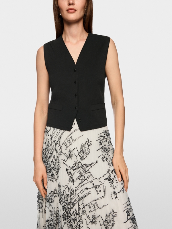 Getailleerd gebreid vest “Rethink Together”