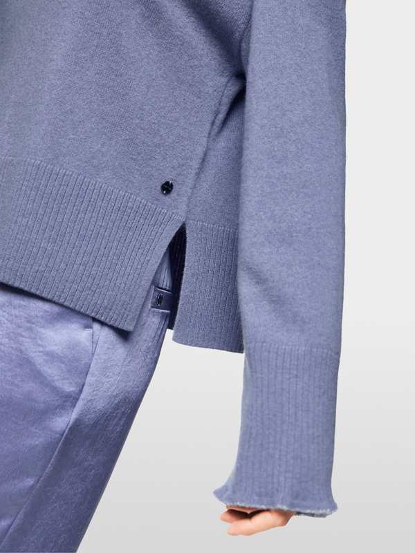 Trui met ruchedetails