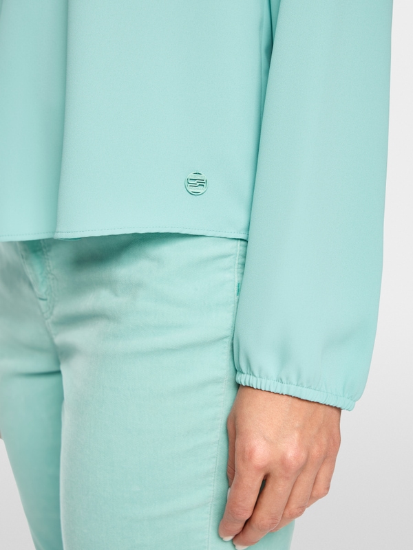 Flowing slip-on blouse with bow
