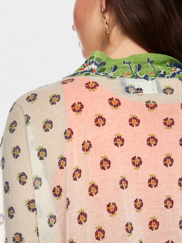 ‘Knitted in Germany’ printed cape