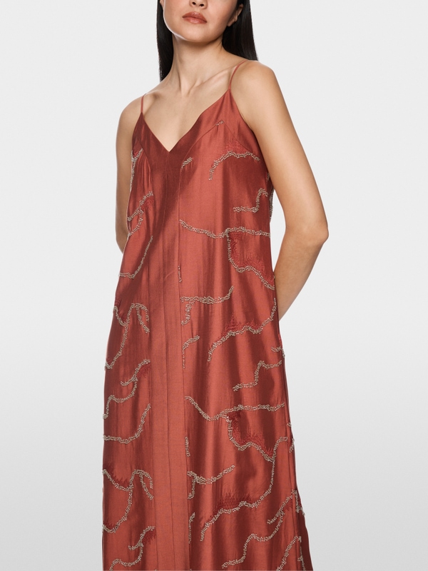 Mid-length dress featuring pearls