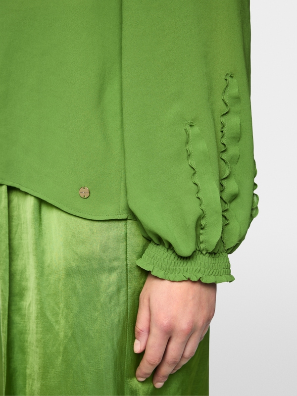 Feminine blouse with ruffle