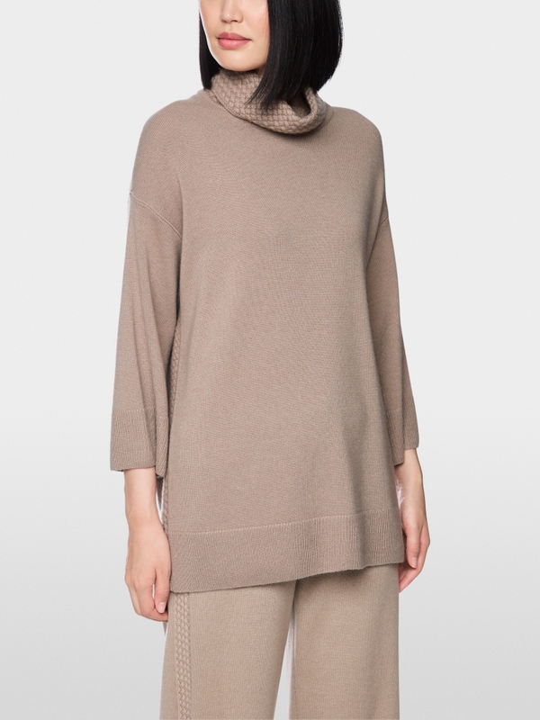 ‘Knitted in Germany’ turtle neck jumper