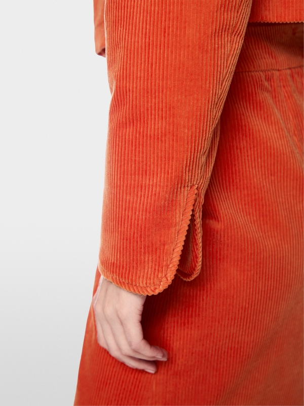 Short jacket with decorative buttons