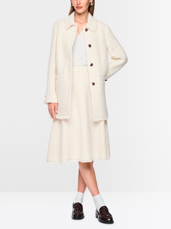 Bouclé jacket with fringing