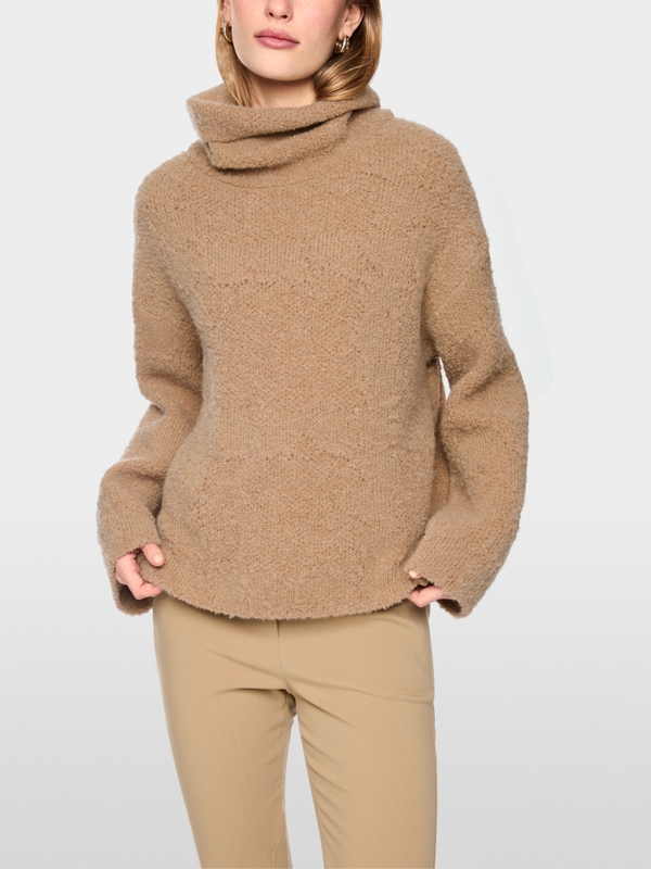 ‘Knitted in Germany’ turtleneck jumper