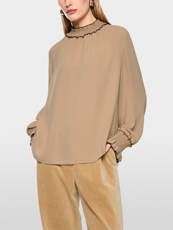 Loose-fitting blouse with smocking